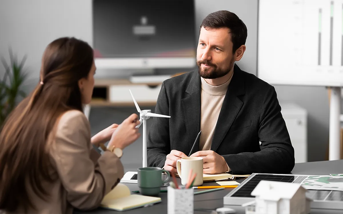 Photo of a financial advisor consulting with a client in an office setting